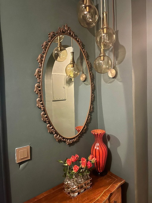 Large Art Nouveau mirror with floral metal frame in very good condition.