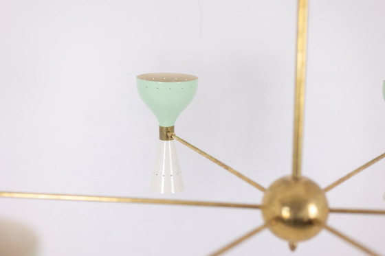 Image 1 of Stralende diabolokroonluchter met 12 kaarslampen. Eigentijds.