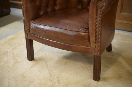 Image 1 of Een paar met leer beklede clubstoelen