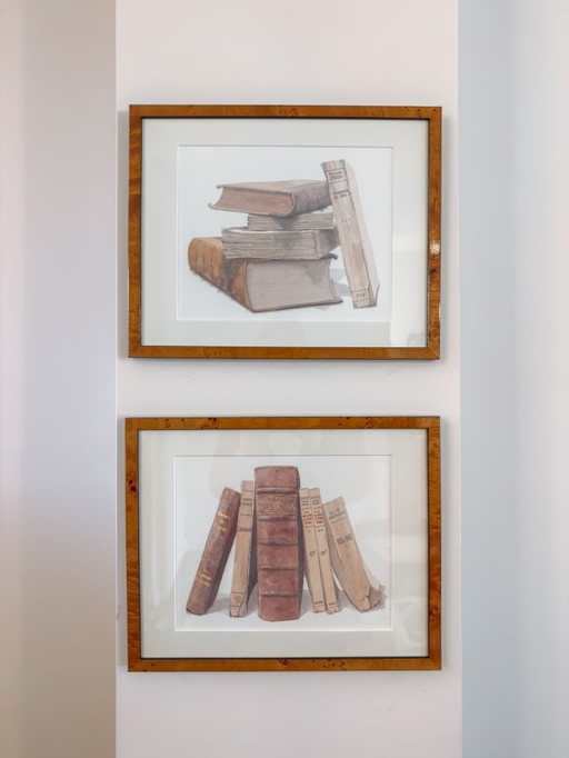 Watercolor paintings of books in burlwood frame, set of 2