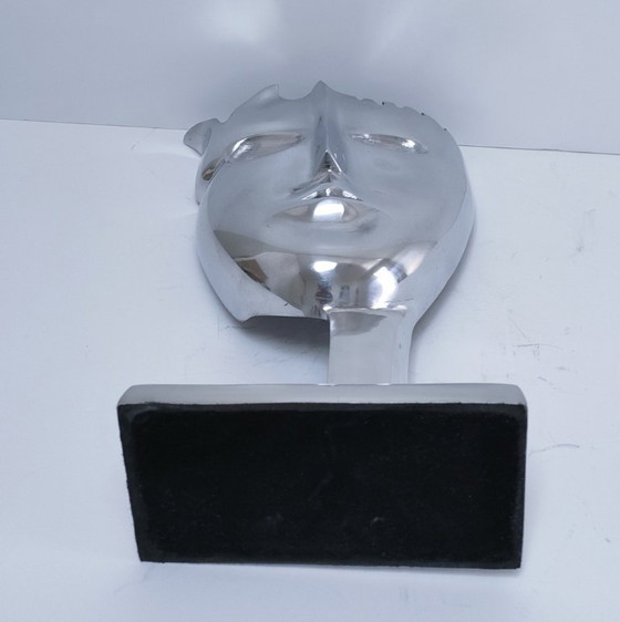 Image 1 of sculpture visage stylisé métal poli