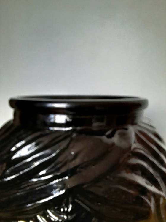 Image 1 of Jarrón o maceta con forma de cabeza de moro, de cristal, 1970.