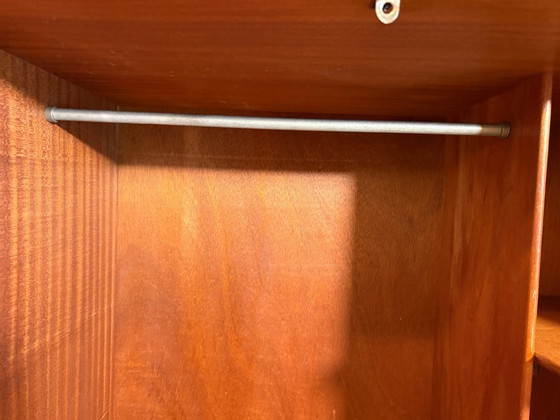 Image 1 of Mid Century Retro Teak Wardrobe by McIntosh (Circa 1960)  A stylish mid century modern teak wardrobe by the renowned British fur