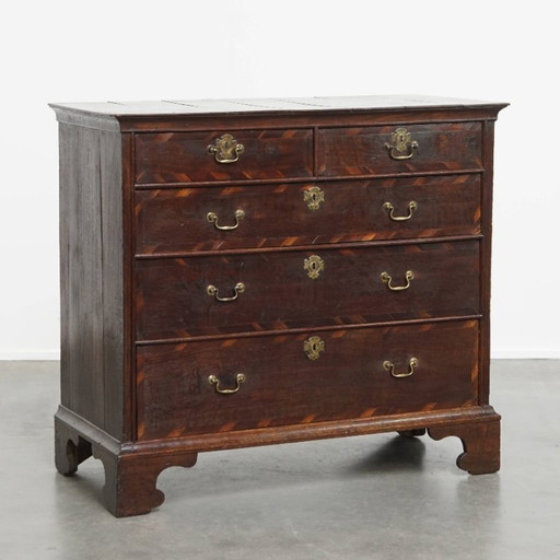 English antique oak chest of drawers with inlays of various woods
