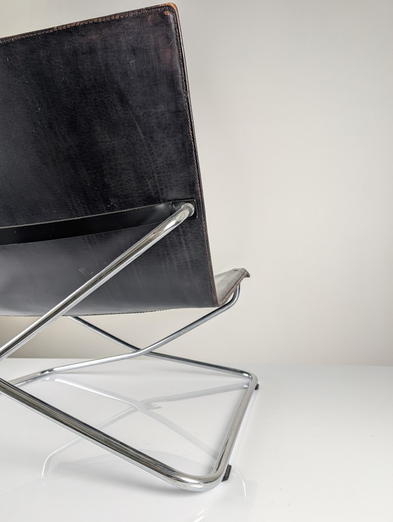 Image 1 of Lounge Chair italiana in pelle nera e cromo anni '80