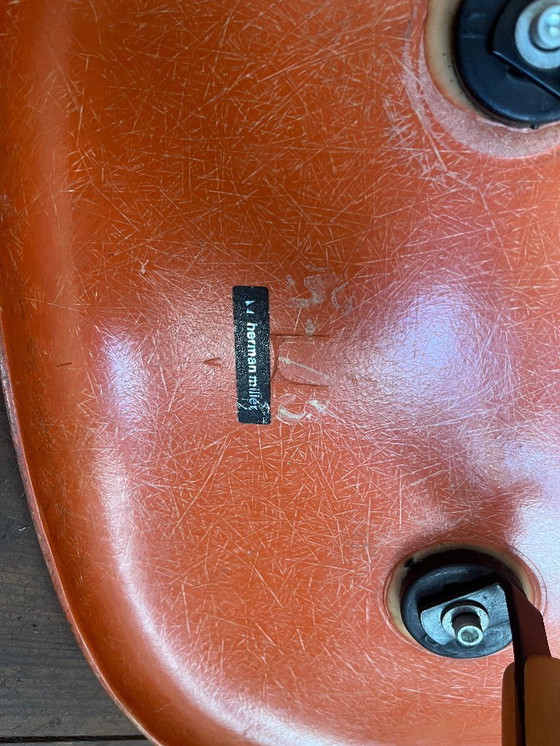 Image 1 of Orange Vitra Eames side chair DSW by Herman Miller (labeled)