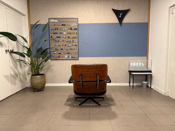 Image 1 of Herman Miller / Contura | Charles & Ray Eames | Lounge Chair & Ottoman | Rosewood & Black Leather | 1x Set