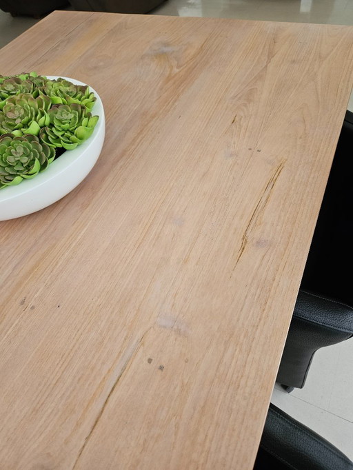 Teakhouten eetkamertafel met 6 leren stoelen