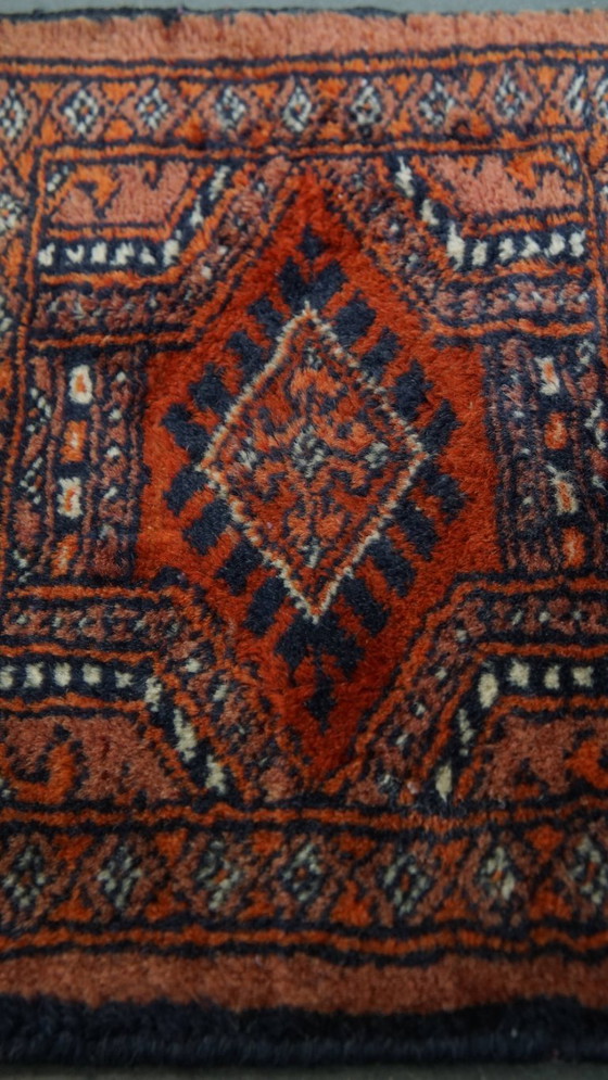 Image 1 of Petit tapis ornemental 38x30cm