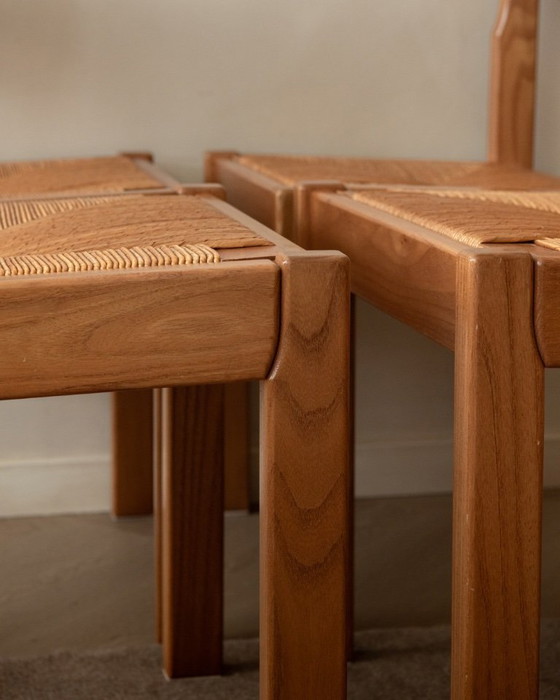 Image 1 of Mid-century eetkamerstoelen van iepenhout en riet van Maison Regain, jaren 70, set van 4