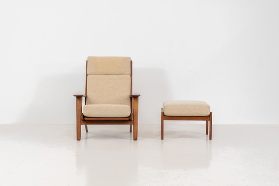 Image 1 of Early GE-290A lounge chair + ottoman in oak by Hans J. Wegner for Getama (Denmark, 1953).