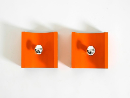 Pair of rare original 1960s Space Age metal wall lamps by Klaus Hempel for Kaiser Leuchten in orange