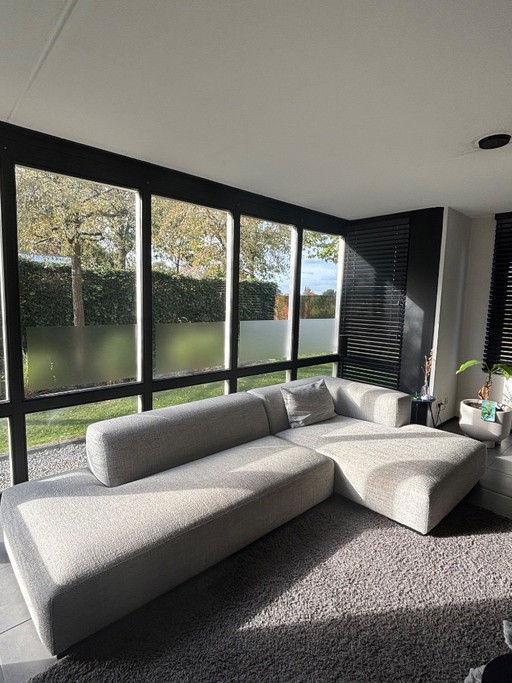 Modernes Ecksofa aus grauem Textil