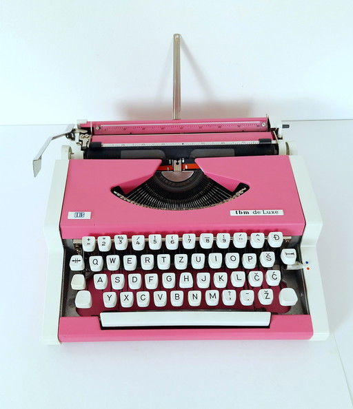 Vintage roze typemachine UNIS TBM De Luxe