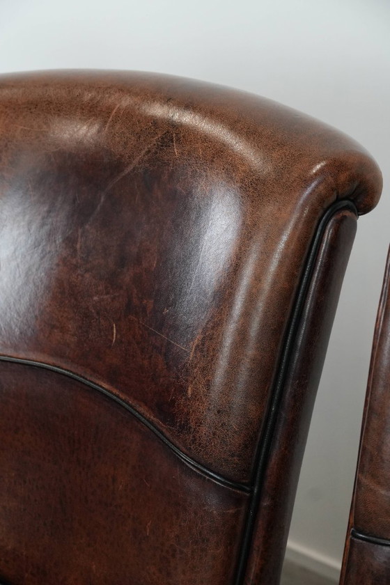 Image 1 of 4 chaises de salle à manger confortables en peau de mouton avec du caractère