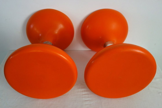 Image 1 of 2 orange diabolo stools from the 70s