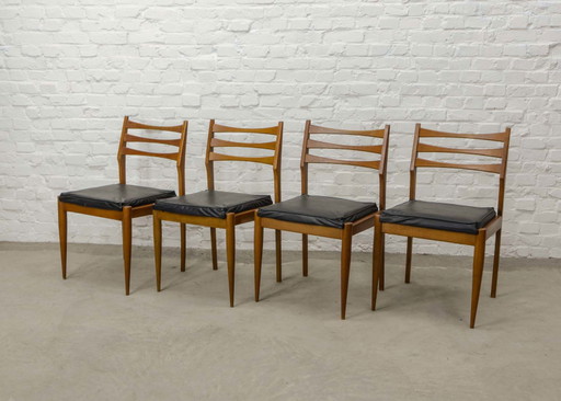 Ensemble de quatre chaises de salle à manger en bois massif de style milieu du siècle avec assise carrée en similicuir noir, ann