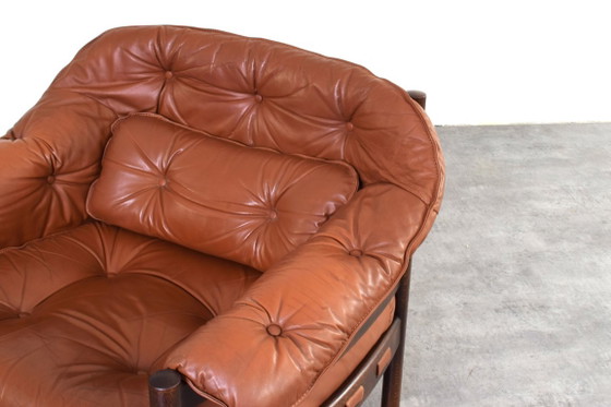 Sillones de roble y cuero de mediados de siglo, diseñados por Arne Norell para Coja en la década de 1960. (photo 14 of 16)