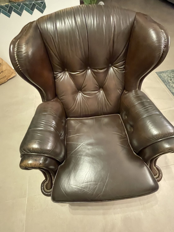 Image 1 of Chesterfield-style wingback armchair