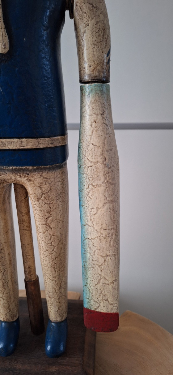 Image 1 of Antieke matroos met roeispanen als armen