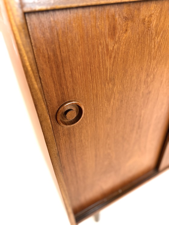 Image 1 of Vintage teak Danish sliding door cabinet '60