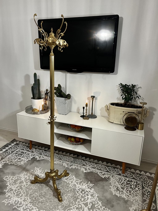 Armario Art Nouveau Hollywood Regency con perchero giratorio de latón dorado