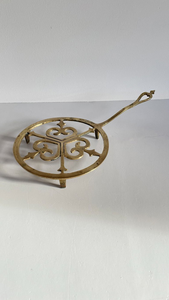 Image 1 of Solid brass trivet