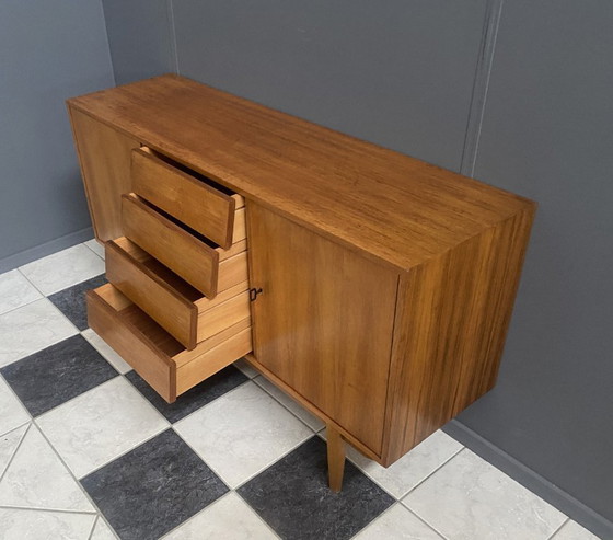 Image 1 of Buffet en bois des années 1960, signé Dehmer, avec 2 portes et 4 tiroirs au centre.