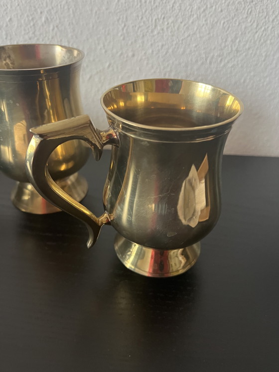 Image 1 of antique brass cups/tankards set