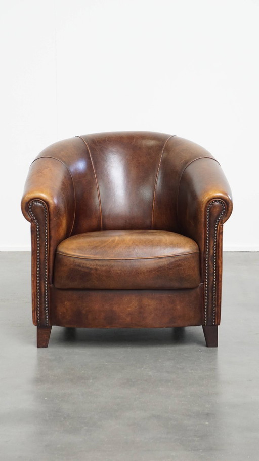 Characterful sheep leather club chair