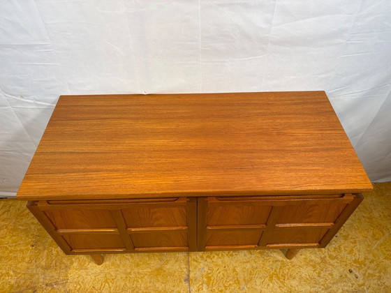 Image 1 of Mid-Century Retro Vintage Teak Sideboard by Nathan 1960s  Square Design • Two Doors • British Design Classic  A striking mid-cen