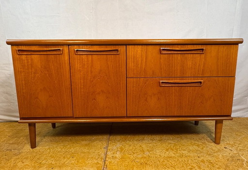 Mid-century retro vintage teak sideboard by Meredew 1960  This elegant teak sideboard by Meredew is a superb example of mid-cent