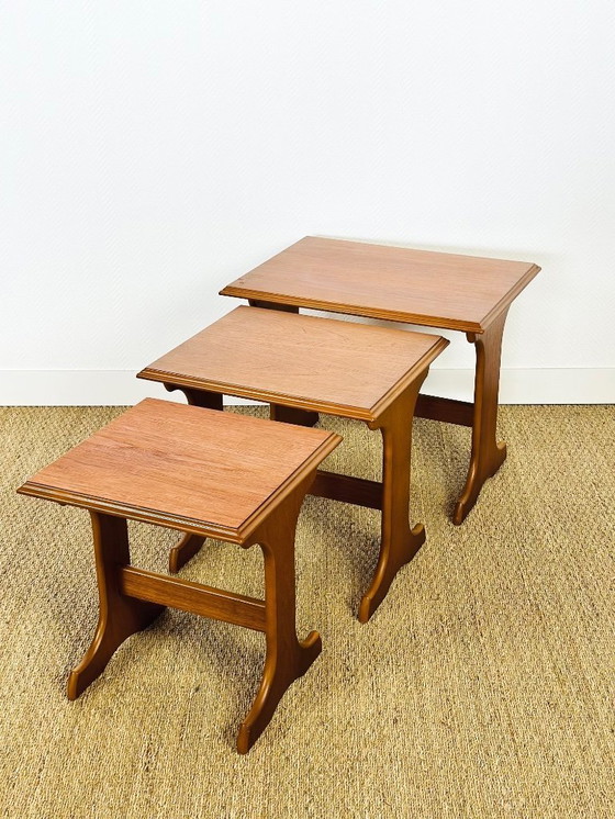 Image 1 of Set van 3 Scandinavische in elkaar passende salontafels van teakhout, 1960