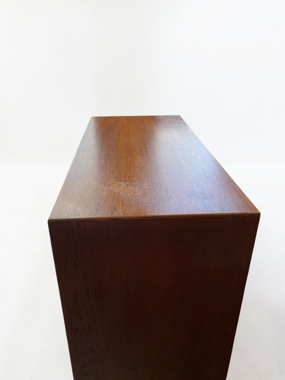 Image 1 of Antique German oak roll-top wardrobe with original key and working wooden roll-top. Made around 1920–1935