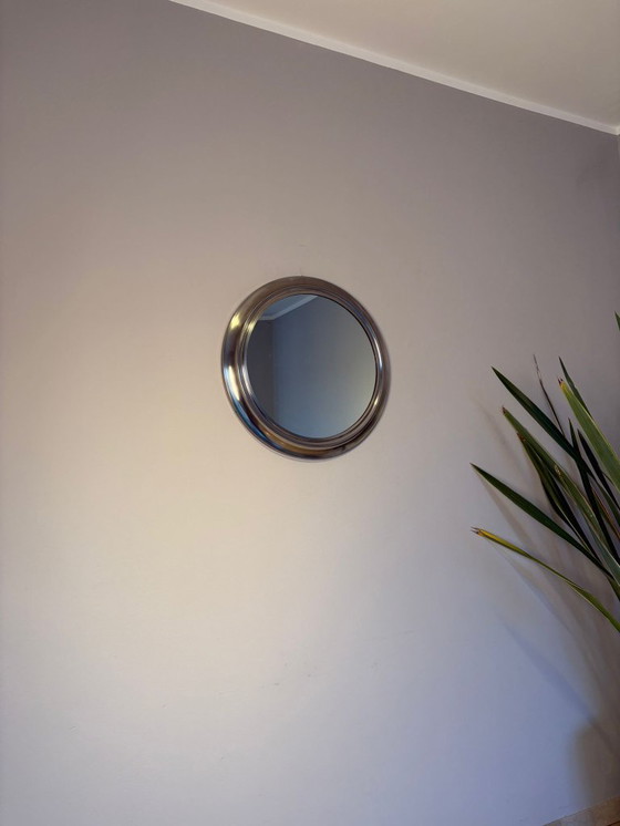 Image 1 of round mirror with metal frame, dating back to the 1970s