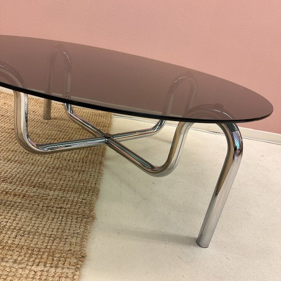 Image 1 of Curved tubular chrome coffee table with round glass top