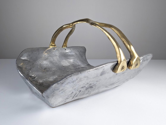 Image 1 of firewood holder by David Marshall, 1980s