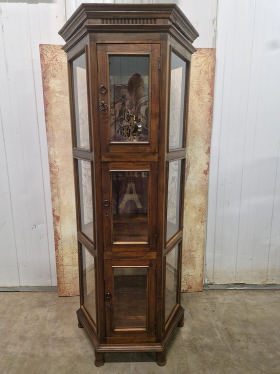 Image 1 of Antieke teakhouten 6-hoekige vitrinekast, servieskast, wijn/whiskey bar met 3 deurtje  afm. 74x65cm en 176cm hoog.