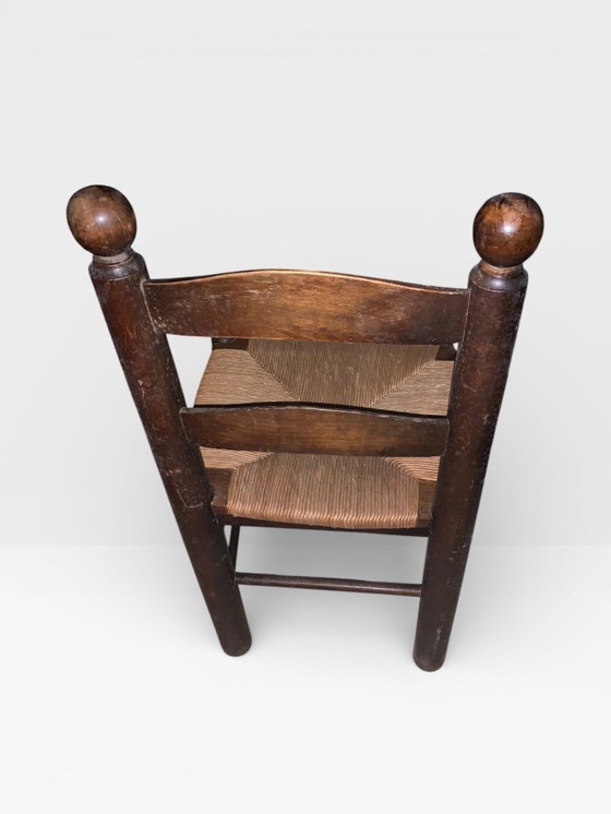 Image 1 of Vintage stoel met sierlijke rugleuning – Zitting van stro –