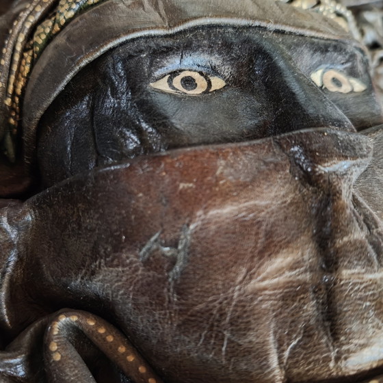 Image 1 of Handcrafted Leather Wall Sculpture 45×45 cm – Tuareg Inspired Mask Relief
