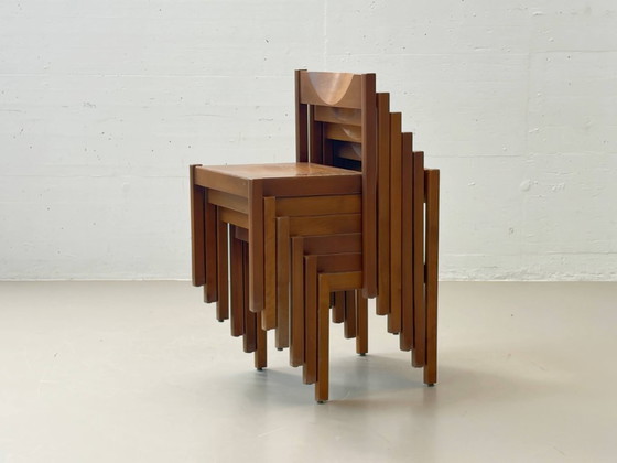 Image 1 of Set van 6 stapelbare houten stoelen in een minimalistisch design uit het midden van de vorige eeuw.