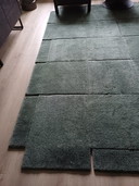 Cesta de casa con diseño de alfombra