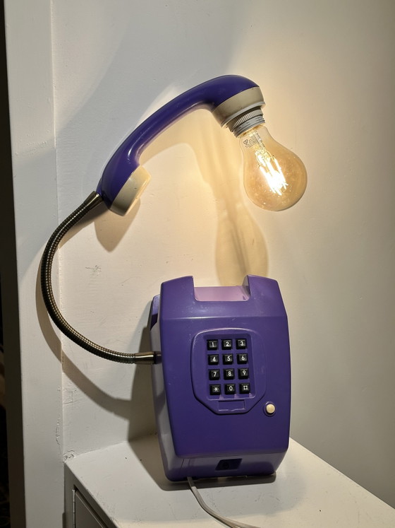 Image 1 of Vintage purple hang-up telephone