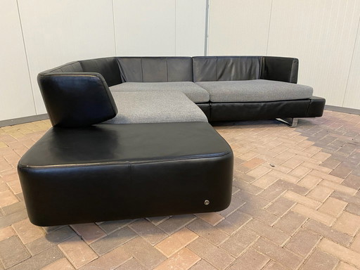 Canapé d'angle en cuir noir Natuzzi Opus – Confort luxueux – Design moderne et élégant – Livraison gratuite