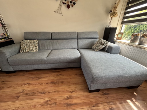 Sofa set with relaxing chaise longue