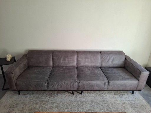 ¡Hermoso sofá de 4 plazas y reposapiés en ecopiel, gris oscuro!