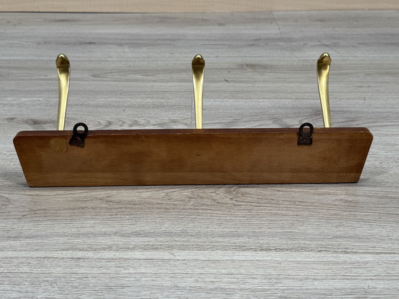 Image 1 of Appendiabiti vintage con ganci dorati - eleganza e carattere