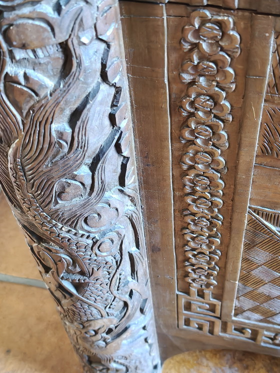 Image 1 of Antique Chinese chest with deep wood carving