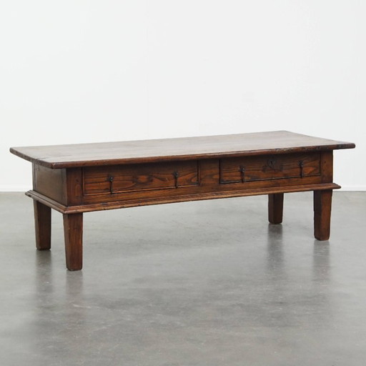 Large antique coffee table with original details and a patina