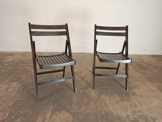 Image 1 of 2 vintage zwarte houten klapstoelen